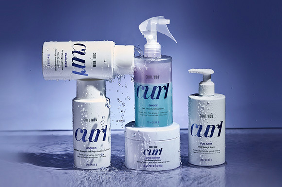 5 Curl Wow Products on purple background